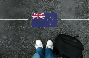 New Zealand Tourist and Flag Image | NZeTA Tourist Visa